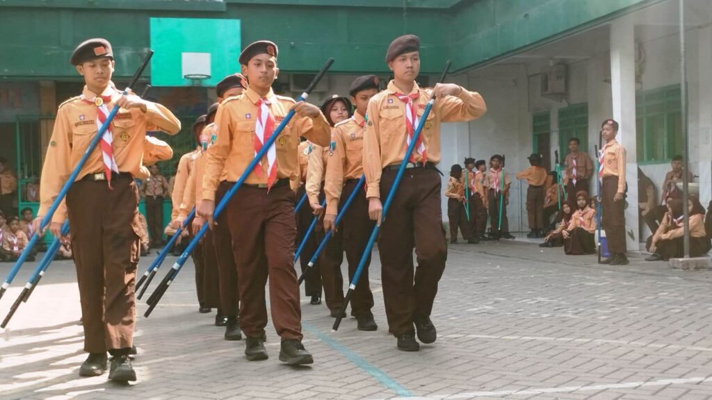 HP-ke-64-SMP-PGRI-1-Buduran-2-1024x576 Upacara Hingga Lomba Seru Warnai Semarak Hari Pramuka ke-64 di SMP PGRI 1 Buduran